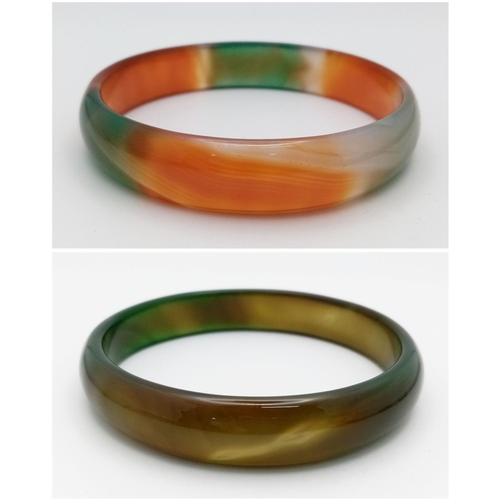 1398 - Two Different Coloured Jade Bangles. Green and multi coloured. 7cm inner diameter.