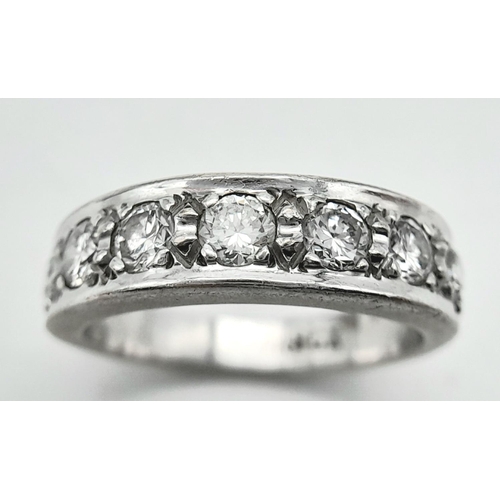 185 - An 18K White Gold Diamond Half Eternity Ring. 0.8ctw approx. 5.7g total weight.