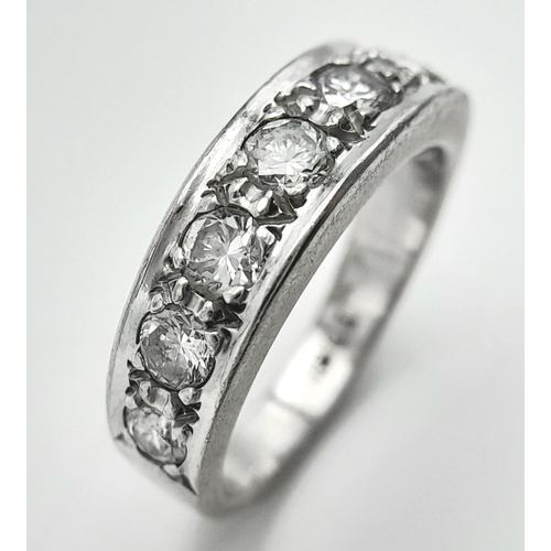 185 - An 18K White Gold Diamond Half Eternity Ring. 0.8ctw approx. 5.7g total weight.