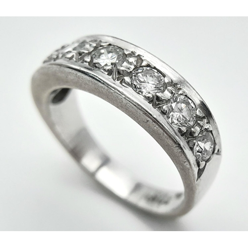 185 - An 18K White Gold Diamond Half Eternity Ring. 0.8ctw approx. 5.7g total weight.