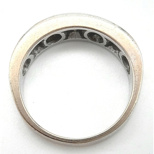 185 - An 18K White Gold Diamond Half Eternity Ring. 0.8ctw approx. 5.7g total weight.