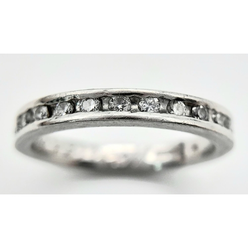 192 - A 950 Platinum Diamond Half Eternity Ring. Size I 1/2. 4.2g total weight.