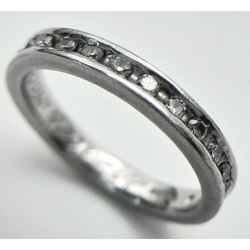 192 - A 950 Platinum Diamond Half Eternity Ring. Size I 1/2. 4.2g total weight.