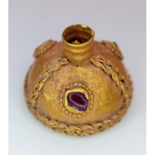 24 - An Ancient Mid Karat (tests as) Gold Byzantine Dagger Pommel Cap. Decorated with garnets - circa 10-... 