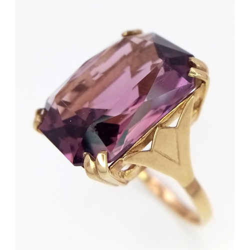 25 - A Vintage 9K Yellow Gold Large Amethyst Ring. Rectangular cut. Size P. 5.7g total weight.