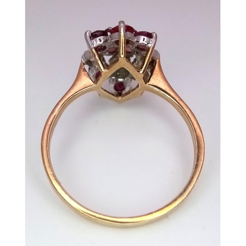 30 - A 9K Yellow Gold Ruby and Diamond Ring. 8 rubies and 4 diamonds. Size M. 2g total weight.