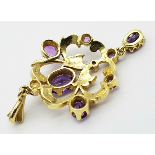 45 - An Antique Edwardian 9K Gold, Amethyst and Seed Pearl Pendant. 4.5cm. 4.6g total weight.