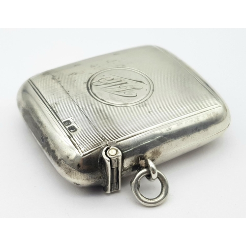 451 - An Antique Sterling Silver Vesta Case. Monogram cartouche. 
Hallmarks for Chester 1906. 5cm x 4cm. 3... 