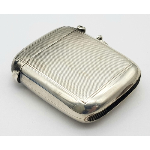 451 - An Antique Sterling Silver Vesta Case. Monogram cartouche. 
Hallmarks for Chester 1906. 5cm x 4cm. 3... 