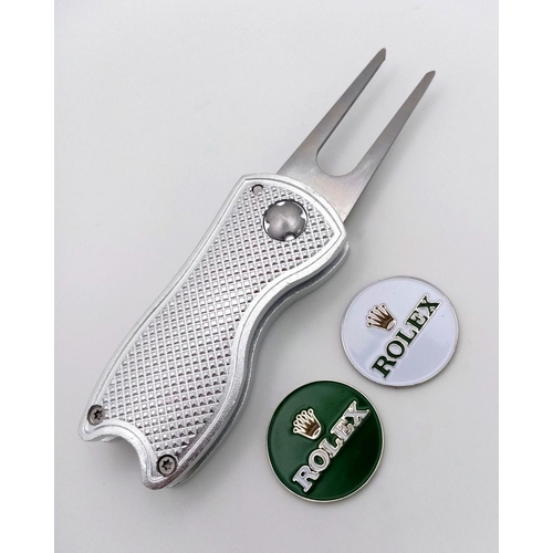 494 - A Rolex Branded Flick Golf Putting Repair Green Tool. Comes with two Rolex branded ball markers. As ... 