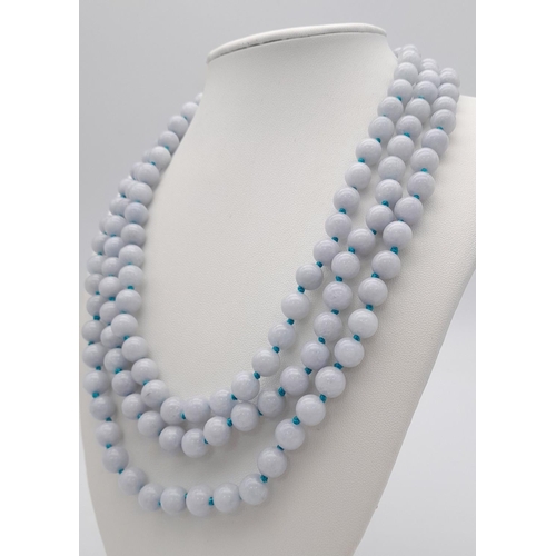 499 - A Three Row Aquamarine Beaded Necklace with Gilded Clasp. 8mm beads. 40-44cm.