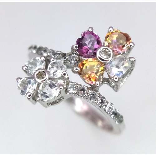 634 - A Stunning Limited Edition Sterling Silver and Multi Colour Topaz. Ring Size S. Set with 1.93 Carats... 