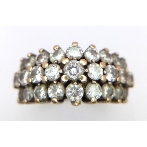 407 - A 9K Yellow Gold Three Row Diamond Ring. 27 diamonds - 2ctw. Size N. 4.9g total weight. ref; 17604