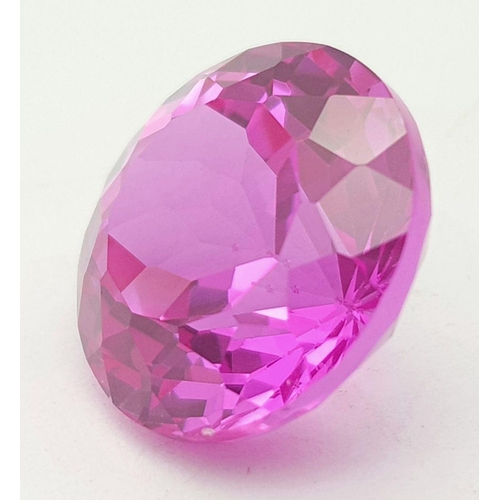 493 - A Bright Pink 17ct Round Cut Rhodolite Gemstone. No visible marks or inclusions. No certificate so a... 