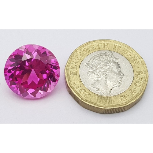 493 - A Bright Pink 17ct Round Cut Rhodolite Gemstone. No visible marks or inclusions. No certificate so a... 