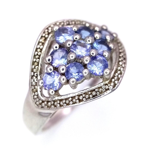 620 - A Limited Edition Sterling Silver Tanzanite Set Ring. Size R1/2 to S. Set with 1.13 Carats of Tanzan... 