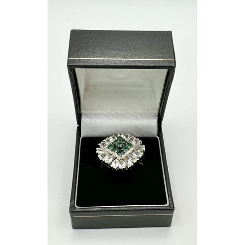 640 - A Limited-Edition Emerald and White Topaz Ring. Size S. 1 of 90 pieces made worldwide. Set with 0.73... 