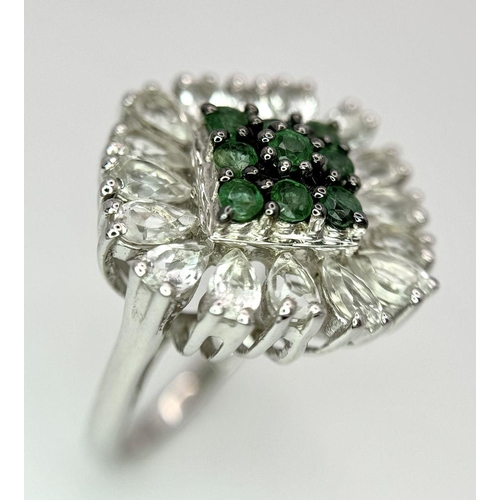 640 - A Limited-Edition Emerald and White Topaz Ring. Size S. 1 of 90 pieces made worldwide. Set with 0.73... 