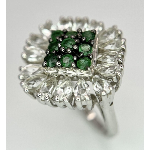 640 - A Limited-Edition Emerald and White Topaz Ring. Size S. 1 of 90 pieces made worldwide. Set with 0.73... 