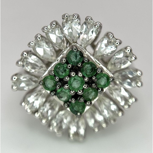 640 - A Limited-Edition Emerald and White Topaz Ring. Size S. 1 of 90 pieces made worldwide. Set with 0.73... 