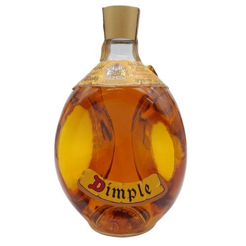 661 - A Circa 1970’s Bottle of 70 Proof Dimple Scotch Whisky. 26 and 2/3rds Fluid Ounces. Unopened and Sea... 