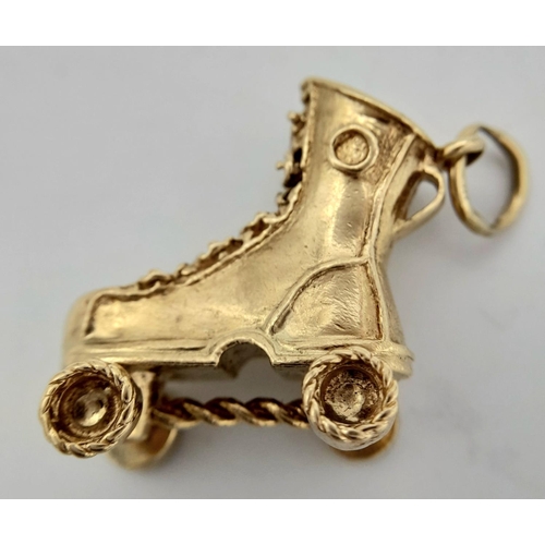 102 - 9K YELLOW GOLD ROLLER SKATE CHARM WITH MOVING WHEELS 8G, 2.5CMx2.5CM.

ref: SC 2013