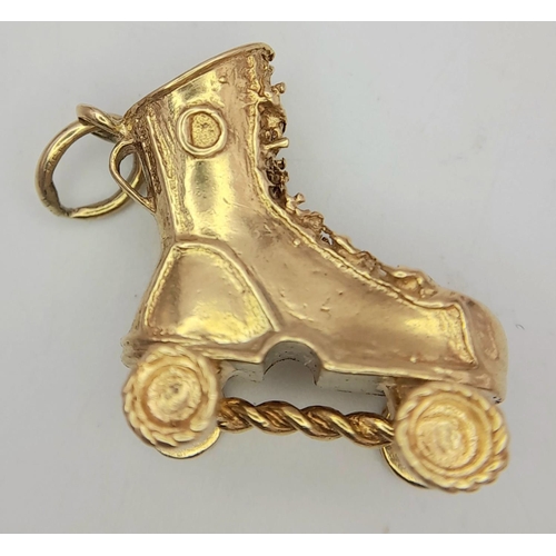 102 - 9K YELLOW GOLD ROLLER SKATE CHARM WITH MOVING WHEELS 8G, 2.5CMx2.5CM.

ref: SC 2013