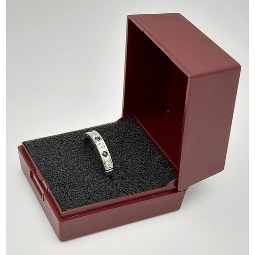 14 - Beautiful 9 carat WHITE GOLD BAND set to top with DIAMONDS and SAPPHIRES. Full UK hallmark. 2.3 gram... 