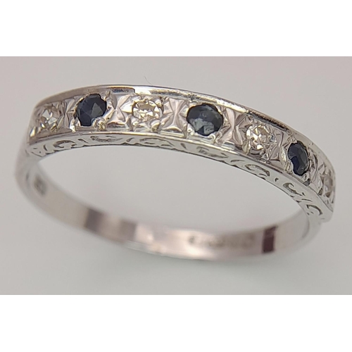 14 - Beautiful 9 carat WHITE GOLD BAND set to top with DIAMONDS and SAPPHIRES. Full UK hallmark. 2.3 gram... 