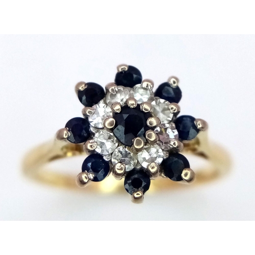 144 - A 18K YELLOW GOLD DIAMOND & SAPPHIRE CLUSTER RING 3.3G SIZE O.

ref: SC 2043