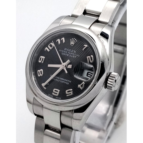 15 - A Rolex Datejust Automatic Ladies Watch. Stainless steel bracelet and case - 27mm. Black swirl dial ... 