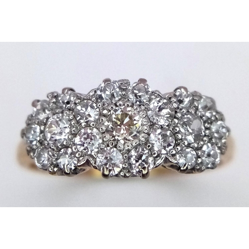 151 - A 18K YELLOW GOLD DIAMOND TRIPLE CLUSTER RING 0.60CT , 2.9G ,  SIZE O 1/2. 

ref: 8518