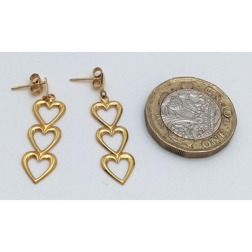 182 - Stunning pair of  9 carat GOLD EARRINGS . Drop style in the form of three hearts. Complete with GOLD... 