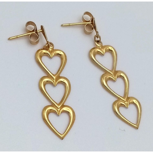 182 - Stunning pair of  9 carat GOLD EARRINGS . Drop style in the form of three hearts. Complete with GOLD... 