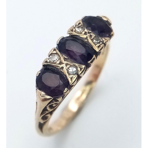 203 - Vintage 9 carat GOLD RING. Having 3 x oval cut GARNETS set to top separated by DIAMONDS . 3 grams. S... 