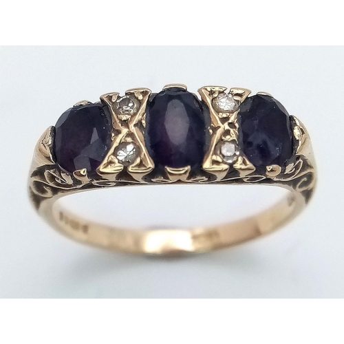 203 - Vintage 9 carat GOLD RING. Having 3 x oval cut GARNETS set to top separated by DIAMONDS . 3 grams. S... 