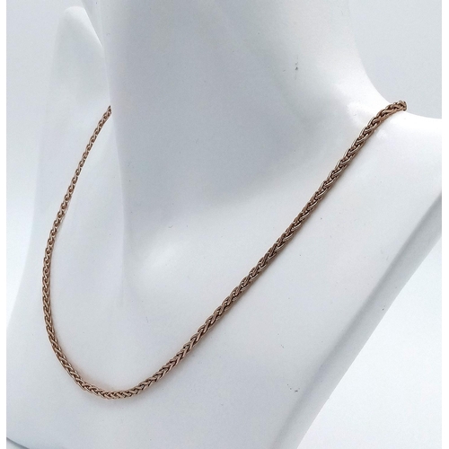 309 - A VINTAGE 9K ROSE GOLD TWIST LINK NECK CHAIN .  5.0gms   66cms