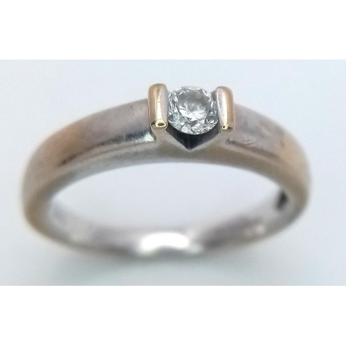 35 - 18 carat WHITE GOLD RING with  0.15 carat DIAMOND SOLITAIRE set to top. 4 grams. Size M.