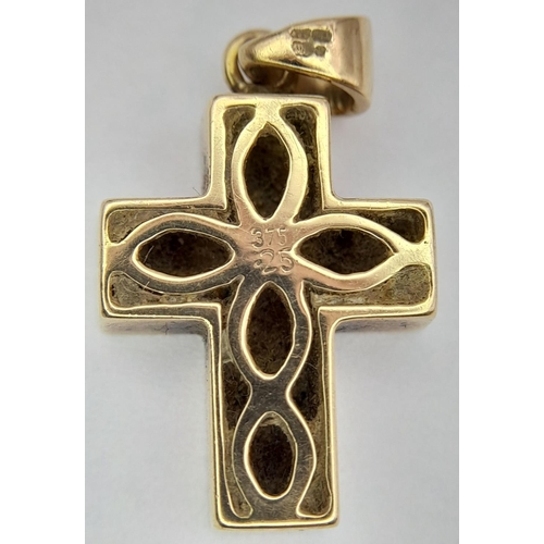 357 - 9 carat GOLD CROSS PENDANT , CLUSTER SET with DIAMONDS. 3 grams. 2.5 cm x 1.5 cm.