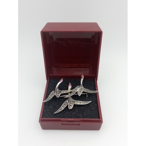 371 - Lovely Antique SILVER MARCASITE FLYING GEESE BROOCH. Having three geese in flight, each with Ruby ey... 