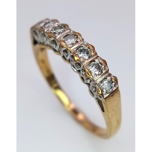 390 - A 9K Yellow Gold Diamond 7 Stone Ring, 0.21ct diamond, 2.5g total weight, size Q.

ref TJ09