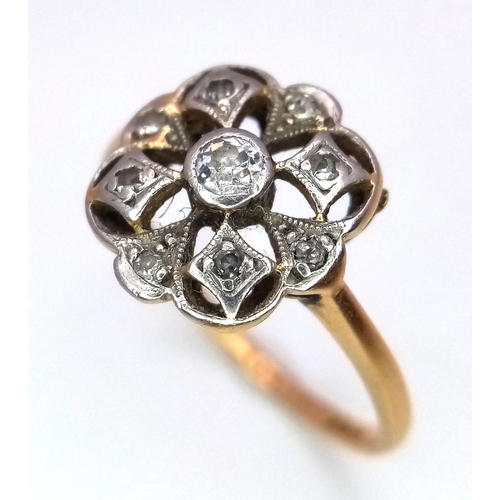 396 - A 9K Yellow Gold (Tested As) Diamond Flower Ring, 0.09ct diamond, 2.3g total weight, size K 1/2. 

r... 