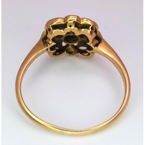 396 - A 9K Yellow Gold (Tested As) Diamond Flower Ring, 0.09ct diamond, 2.3g total weight, size K 1/2. 

r... 