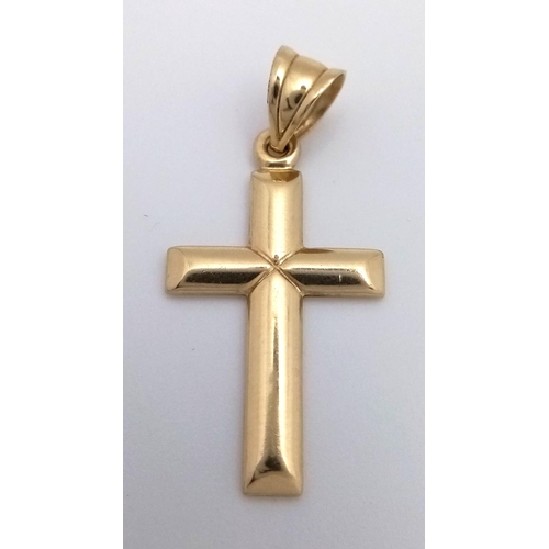 417 - A 14K Yellow Gold Engraved Cross Pendant, 1.57g total weight , 35mm x 17mm.

ref 1550I