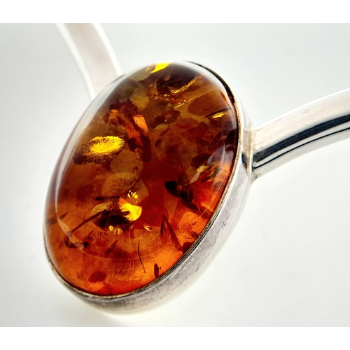 42 - Stunning SILVER and AMBER CHOKER NECKLACE. Having a large oval AMBER CABOCHON mounted to front. Full... 