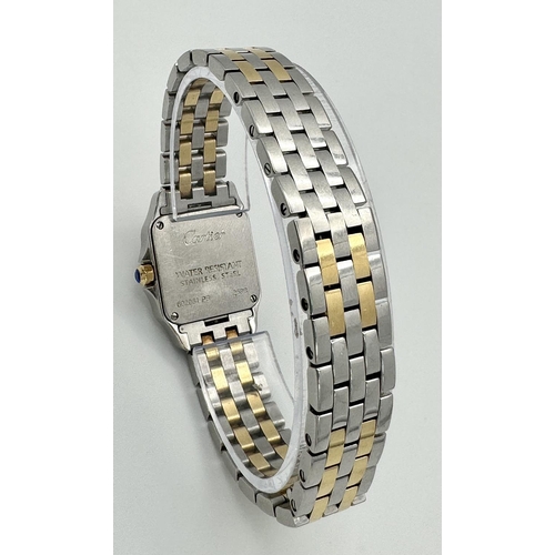 43 - A Vintage Cartier Santos Quartz Ladies Watch. Gold and steel bracelet. Case - 21mm. White dial with ... 