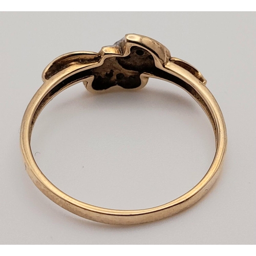 49 - Delightful 9 carat GOLD RING having DIAMOND HEARTS set  to centre. 2.1 grams. Size Q 1/2 - R.