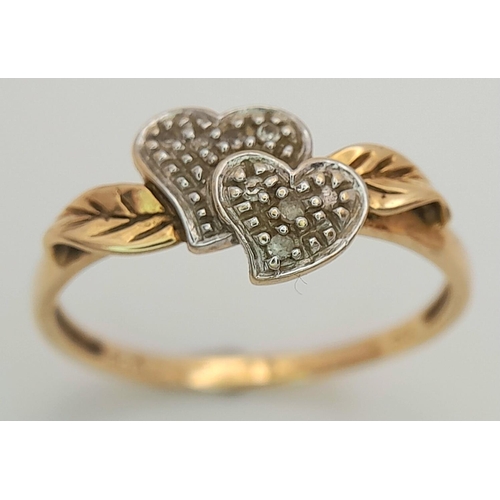 49 - Delightful 9 carat GOLD RING having DIAMOND HEARTS set  to centre. 2.1 grams. Size Q 1/2 - R.