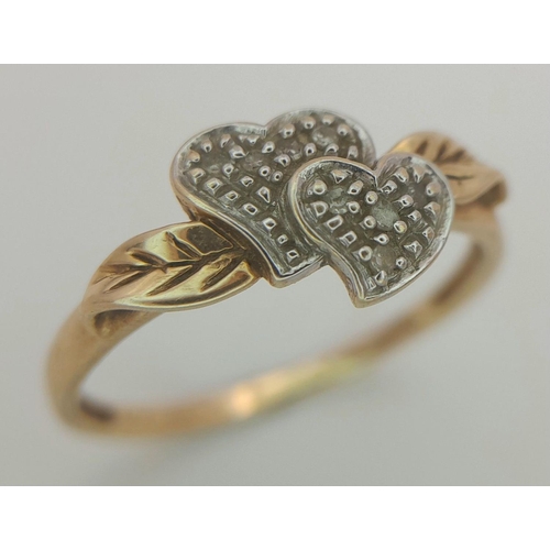 49 - Delightful 9 carat GOLD RING having DIAMOND HEARTS set  to centre. 2.1 grams. Size Q 1/2 - R.