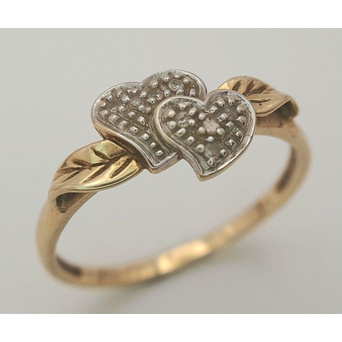 49 - Delightful 9 carat GOLD RING having DIAMOND HEARTS set  to centre. 2.1 grams. Size Q 1/2 - R.